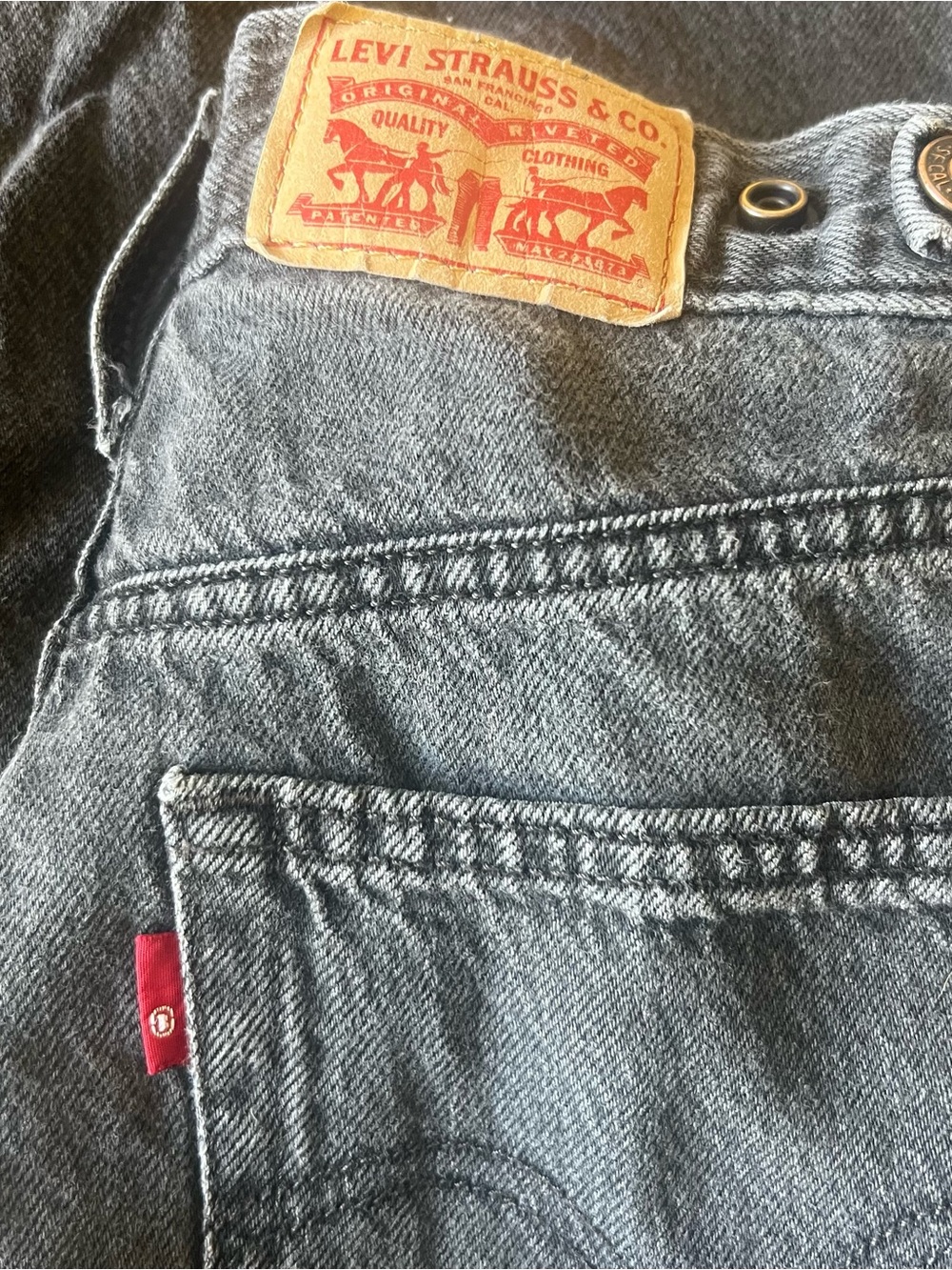 Levi’s black cinch waist baggy size 27